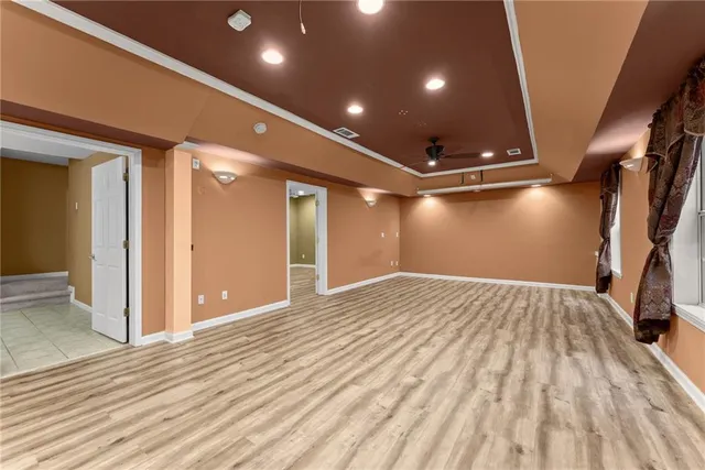 a view of a yard with large trees