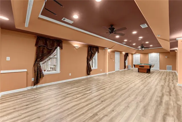 a backyard of a house with lots of green space