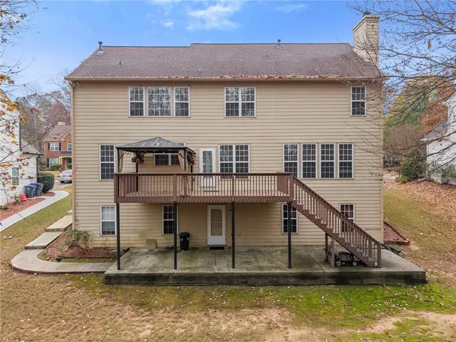 a view of balcony with wooden floor