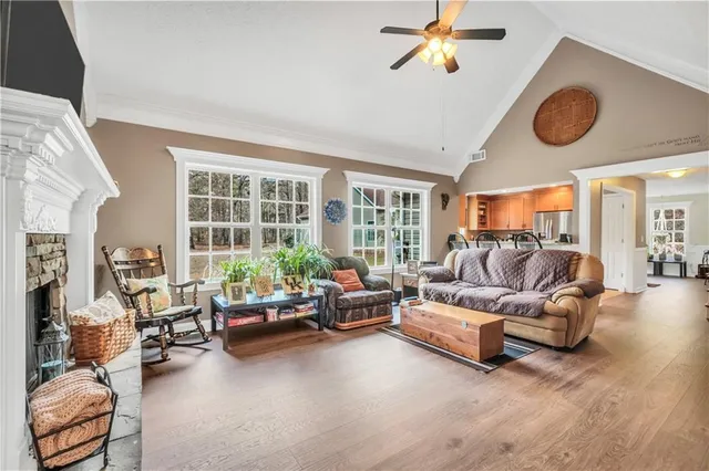 a kitchen with stainless steel appliances granite countertop a stove and a sink