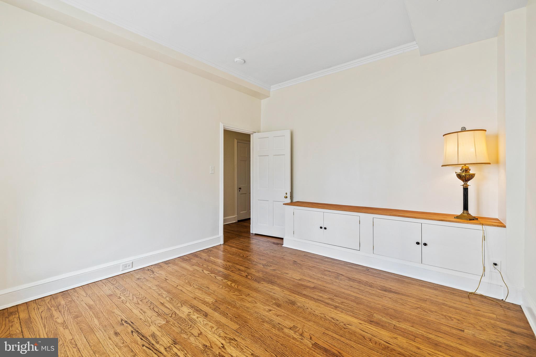 6 Upland Road, Unit B1 Baltimore, MD 21210 - Photo 33 of 39 Bedroom 3 with built-in cabinetry