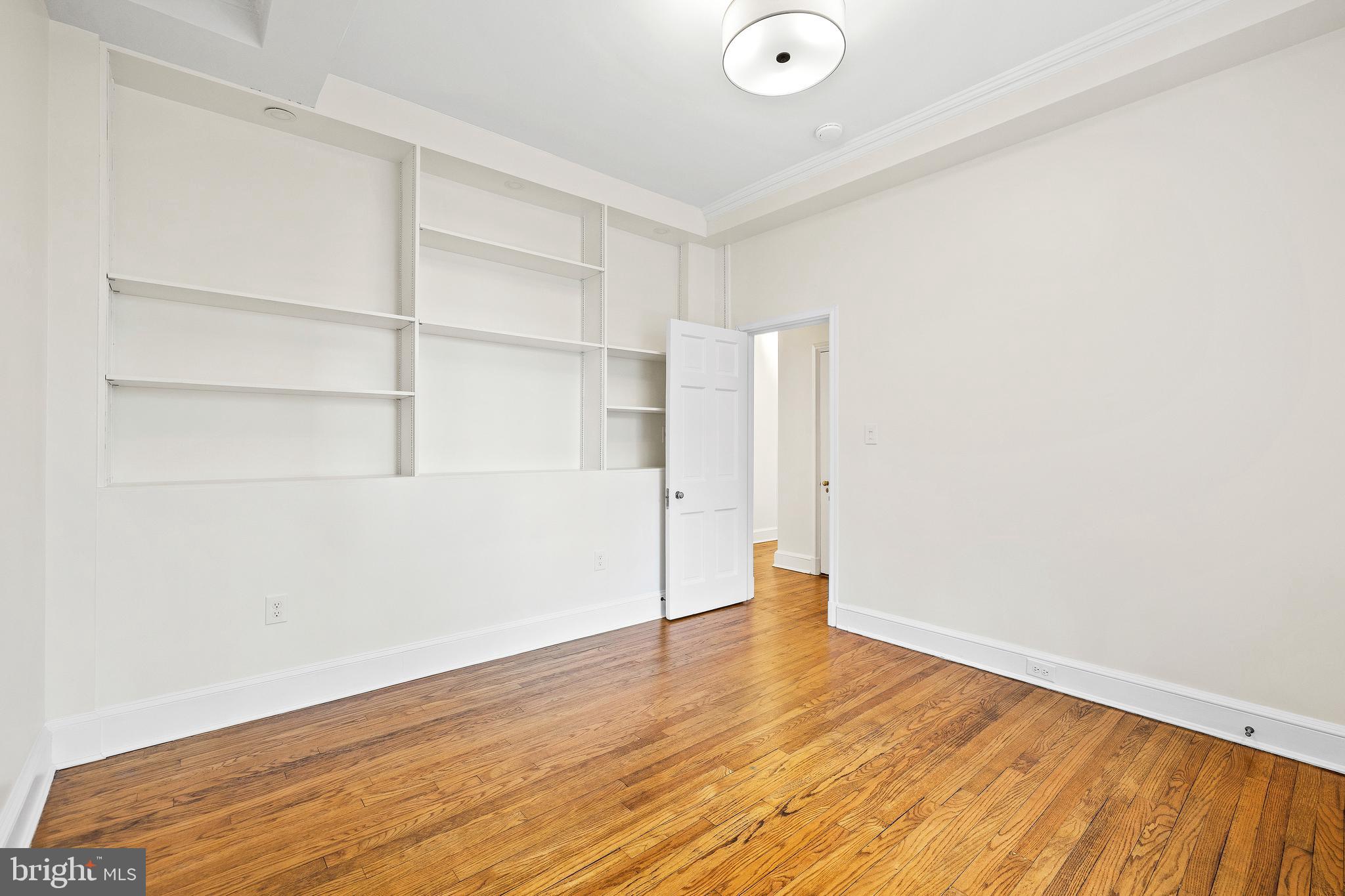 6 Upland Road, Unit B1 Baltimore, MD 21210 - Photo 35 of 39 Bedroom 2 with built-in shelving