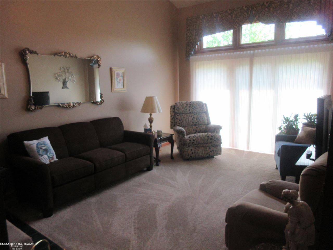 16752 Fieldstone Macomb, MI 48042 - Photo 9 of 29 Newer carpeting and custom blinds on doorwall.