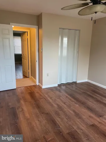 a house with a swimming pool in front of it