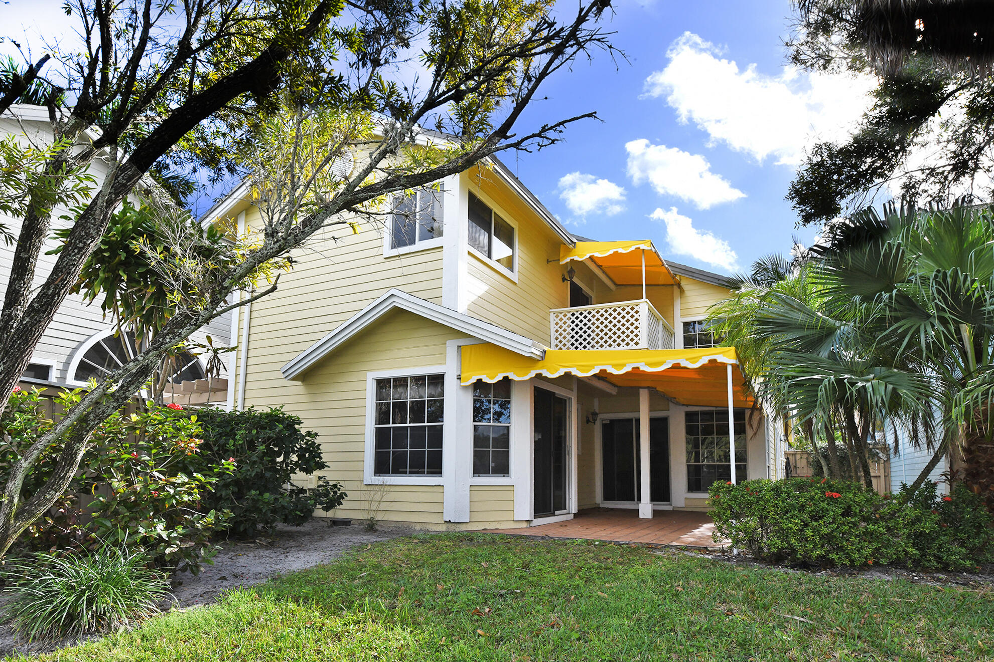 5135 Pointe Alexis Boca Raton, FL 33431 - Photo 35 of 35 front view of a house with a garden