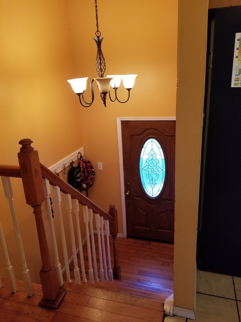 181 Oxford Road Bolingbrook, IL 60440 - Photo 13 of 29 a view of entryway with wooden floor