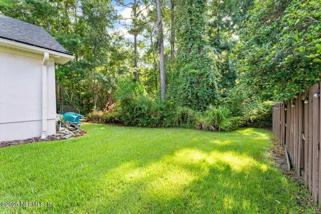a view of a wooden deck and bench