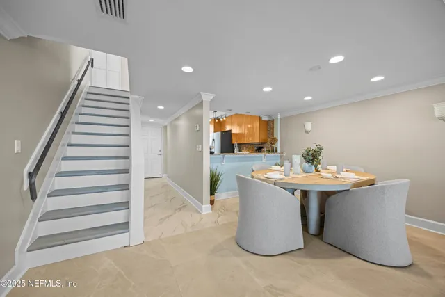 a living room with furniture and a couch