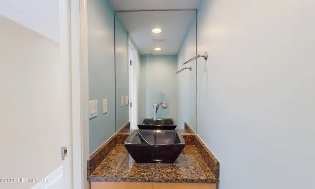 a view of a swimming pool with a lounge chairs