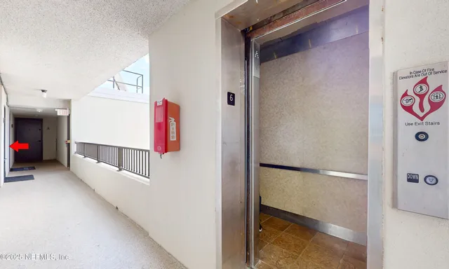 a view of a pathway with a yard