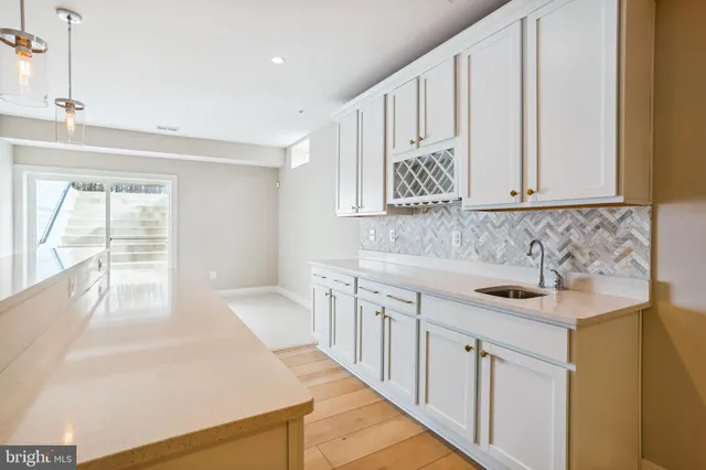 a bathroom with a sink a toilet and a bathtub