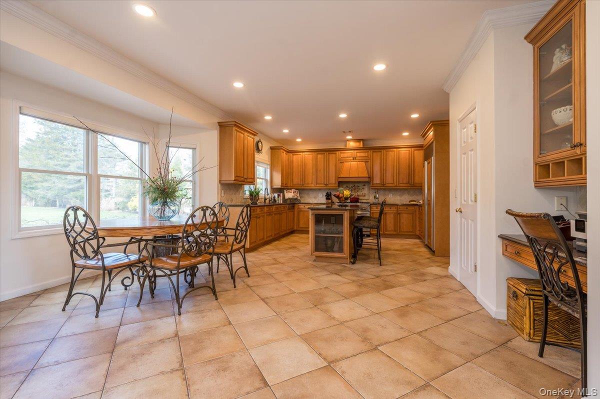 129 Round Swamp Road Huntington, NY 11743 - Photo 12 of 49 Very generous dining area with large window.