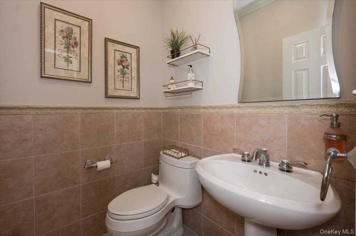 129 Round Swamp Road Huntington, NY 11743 - Photo 20 of 50 Powder room located on the first floor and perfect for guests.