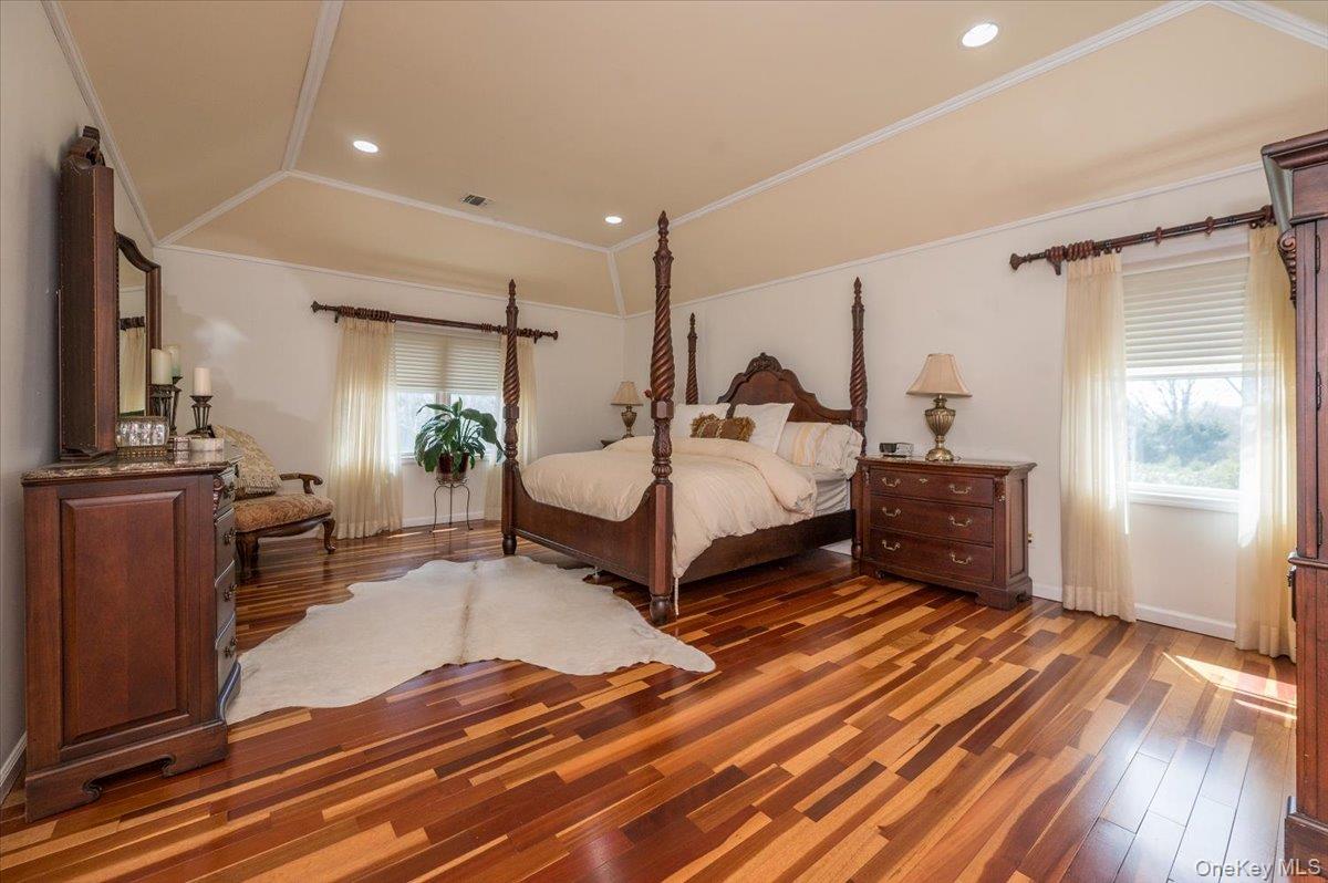 129 Round Swamp Road Huntington, NY 11743 - Photo 25 of 50 Wood flooring, tray ceilings, recessed lighting, molding details and large windows.