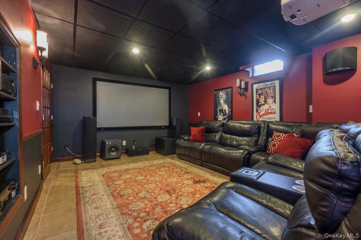 129 Round Swamp Road Huntington, NY 11743 - Photo 35 of 50 Fully equipped media room with built in shelving, video and sound equipment.