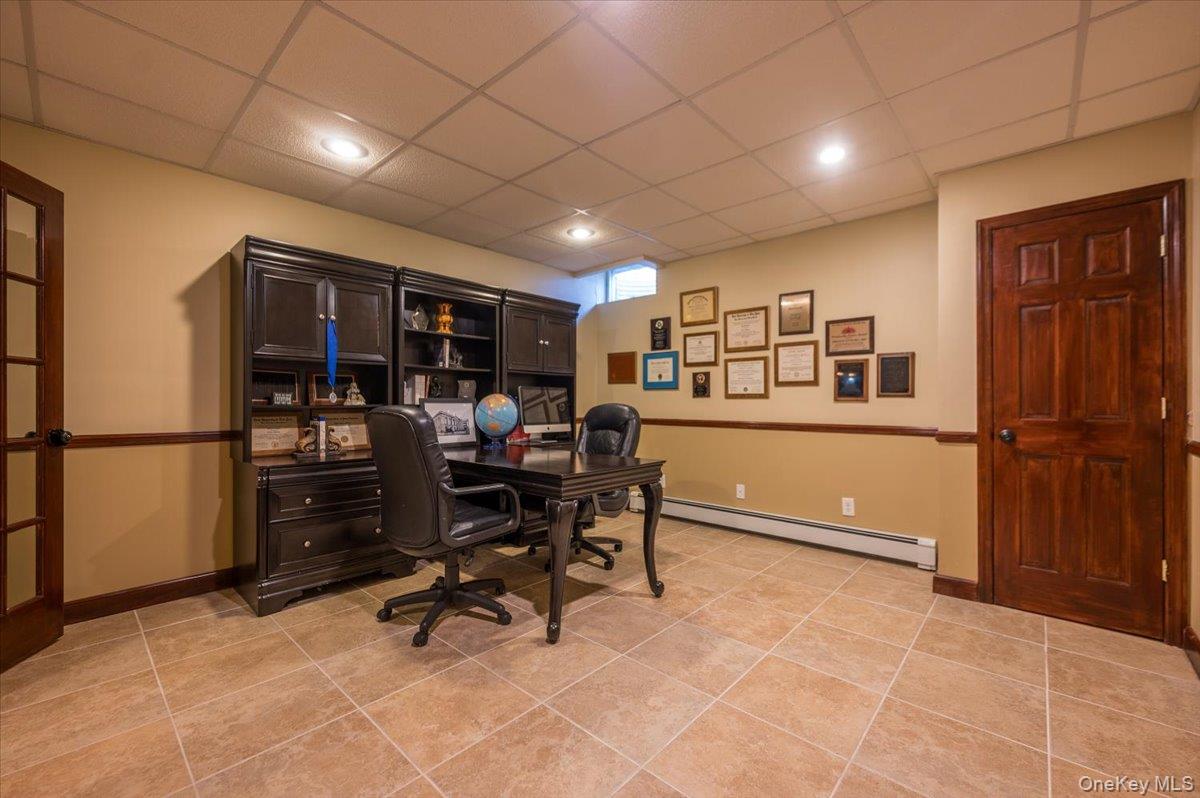 129 Round Swamp Road Huntington, NY 11743 - Photo 37 of 50 Located in the basement level. Tile flooring and doors to close the space off and make it private.