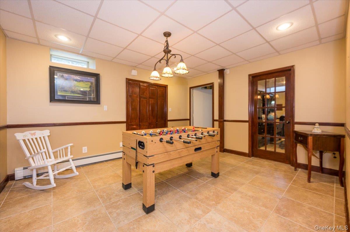 129 Round Swamp Road Huntington, NY 11743 - Photo 38 of 50 Located in the lower level. Tile flooring, decorative moldings.