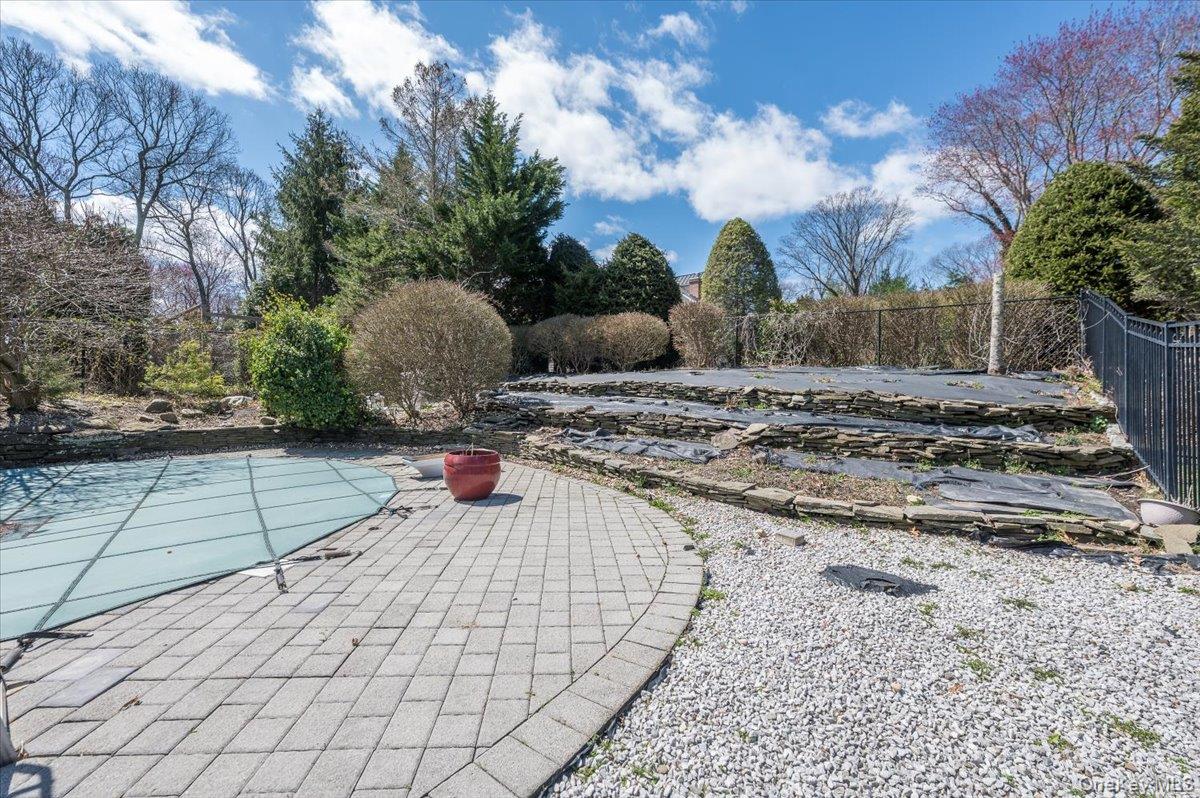 129 Round Swamp Road Huntington, NY 11743 - Photo 45 of 50 Patio area with terraced garden.