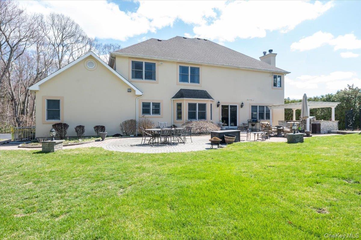 129 Round Swamp Road Huntington, NY 11743 - Photo 47 of 50 Large lawn, and wonderful patio area.