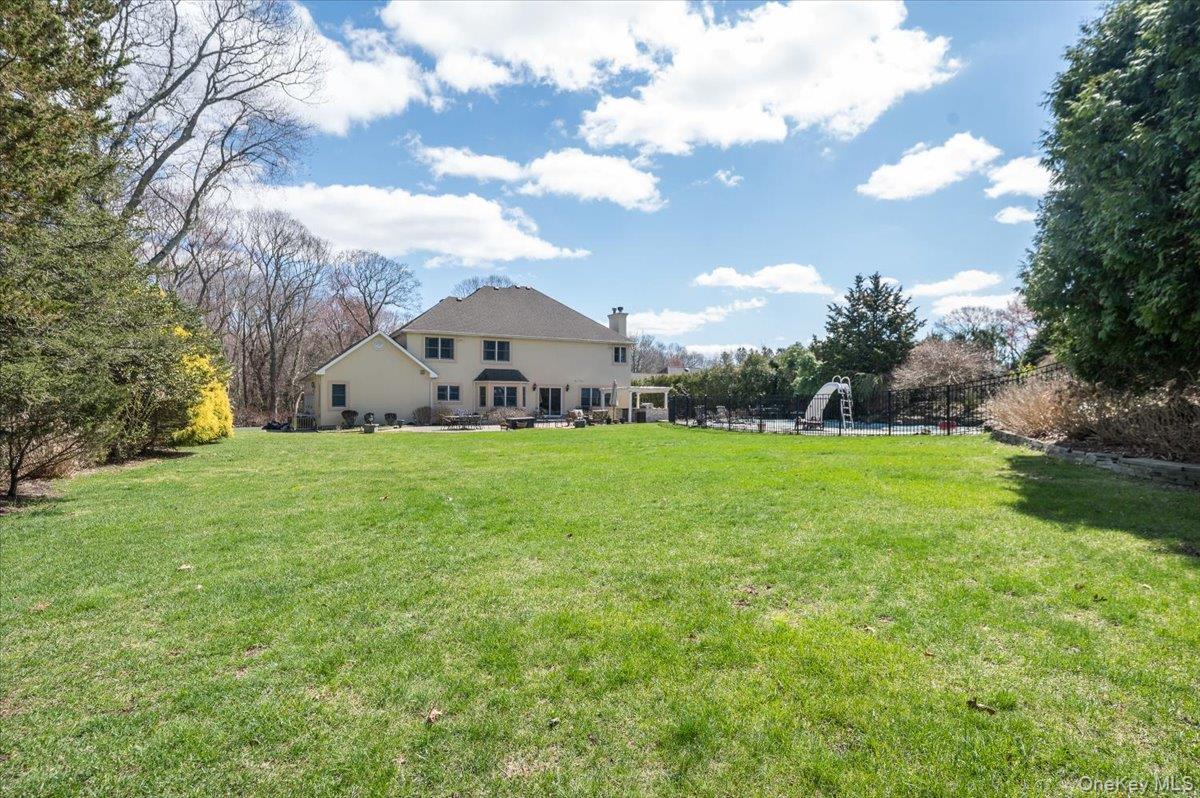 129 Round Swamp Road Huntington, NY 11743 - Photo 48 of 50 Large property with plenty of grass area and mature plantings.