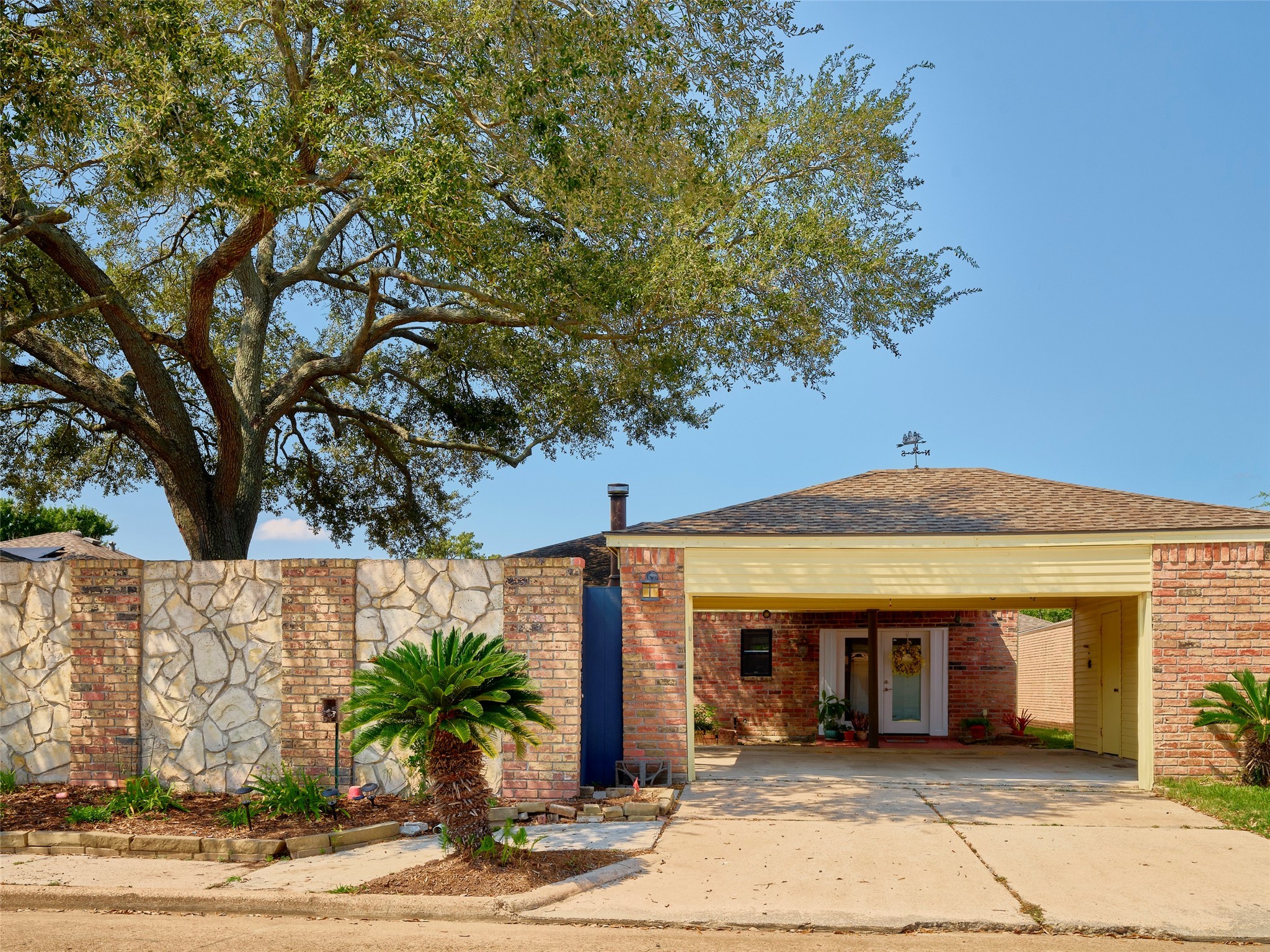 8315 Terrace Wind Lane Houston, TX 77040 - Photo 1 of 50 a front view of a house