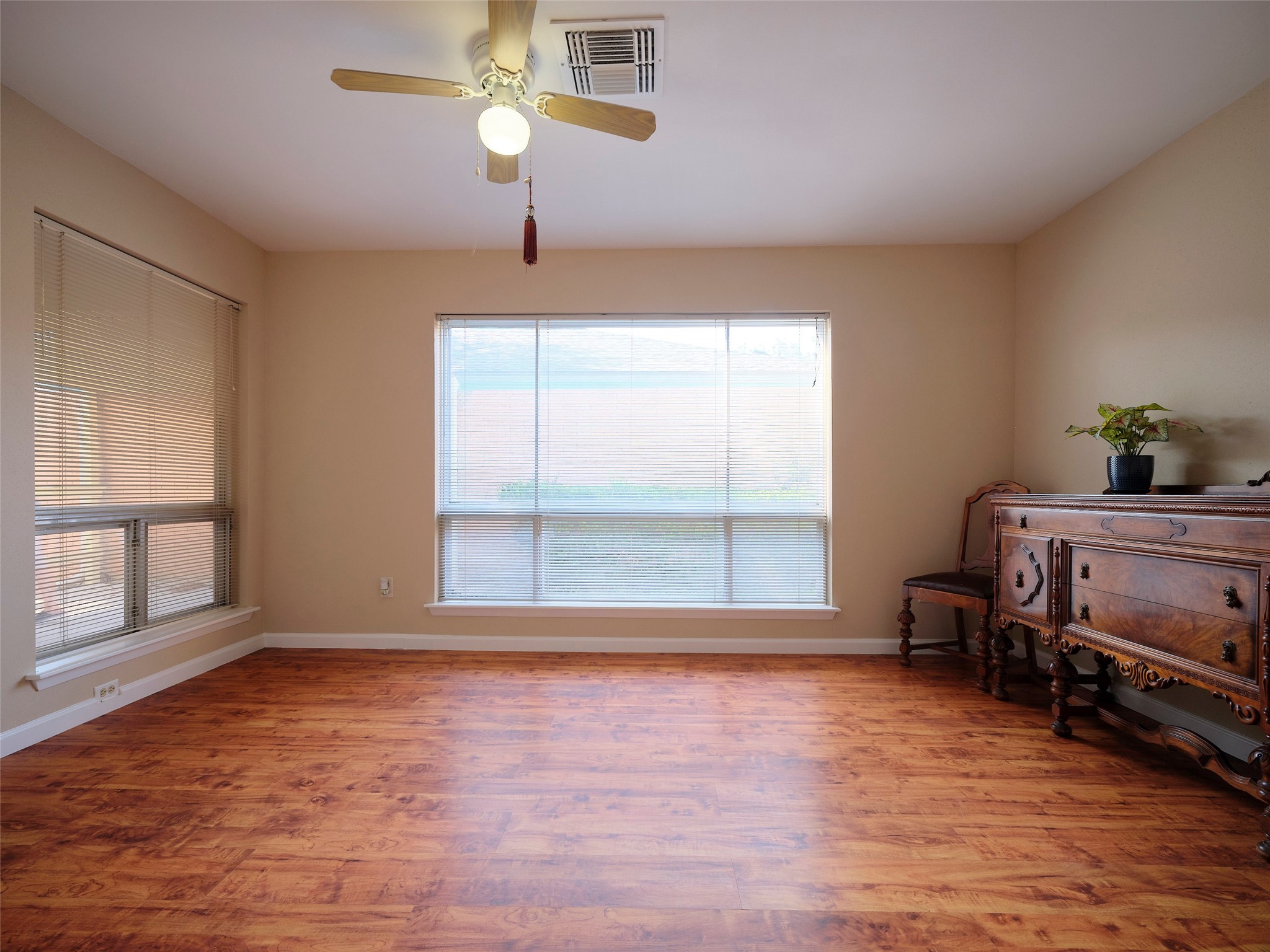 8315 Terrace Wind Lane Houston, TX 77040 - Photo 13 of 50 a view of room with furniture and a window