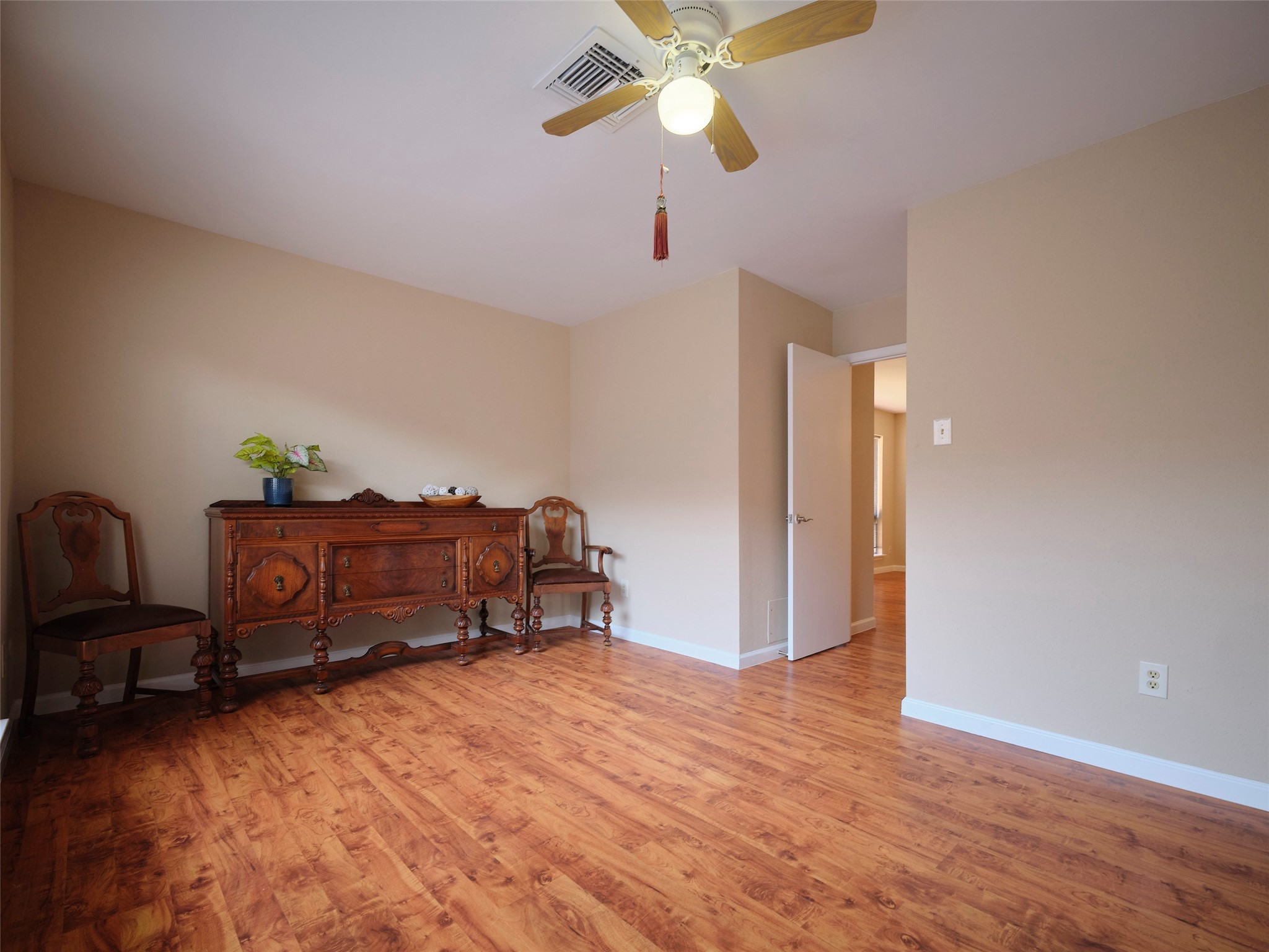 8315 Terrace Wind Lane Houston, TX 77040 - Photo 14 of 50 a room with closet and wooden floor