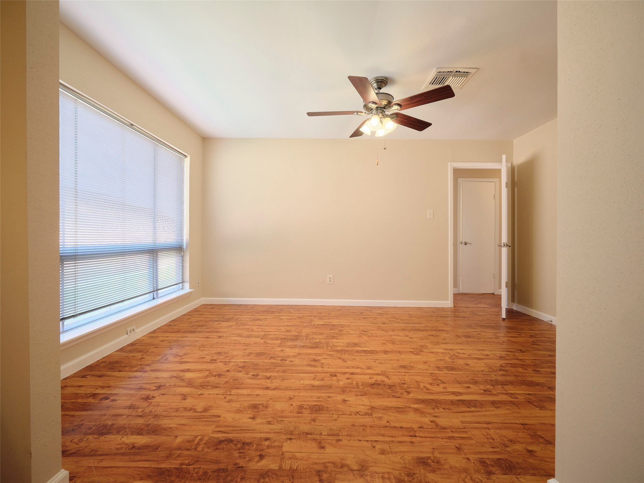8315 Terrace Wind Lane Houston, TX 77040 - Photo 16 of 50 a view of an empty room with a window