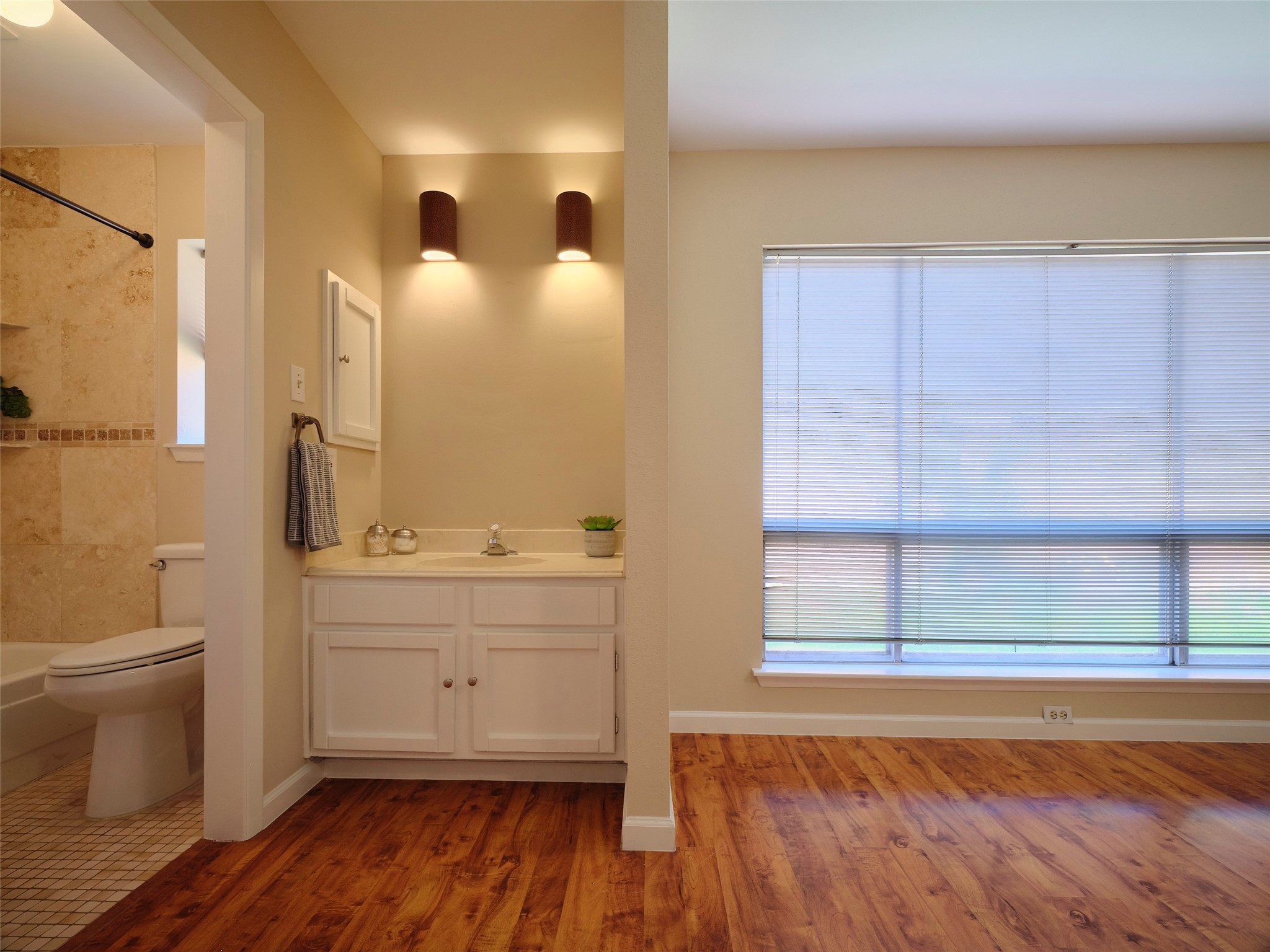 8315 Terrace Wind Lane Houston, TX 77040 - Photo 17 of 50 a bathroom with a sink a toilet and a bathtub