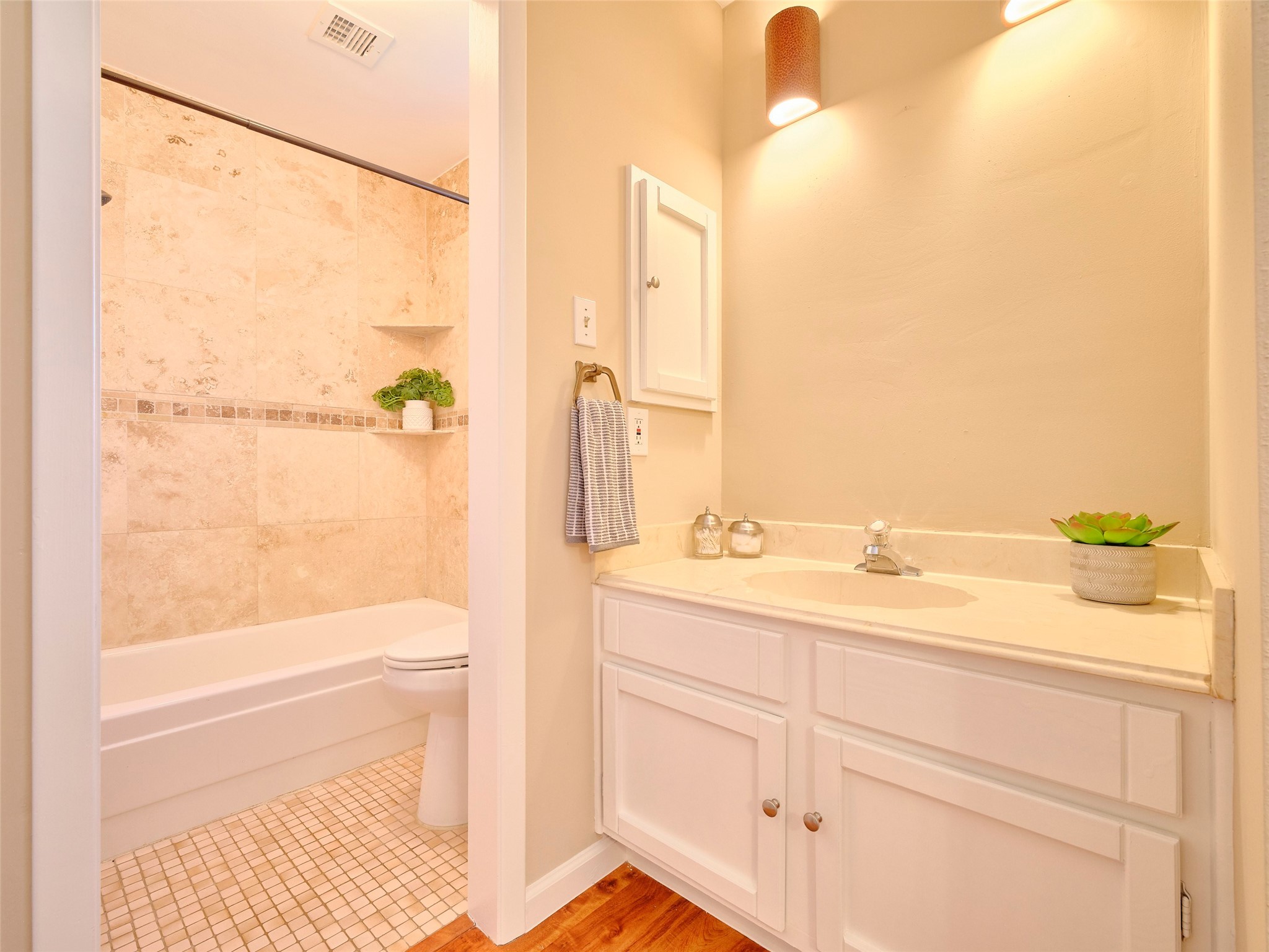 8315 Terrace Wind Lane Houston, TX 77040 - Photo 18 of 50 a bathroom with a granite countertop sink a toilet and shower