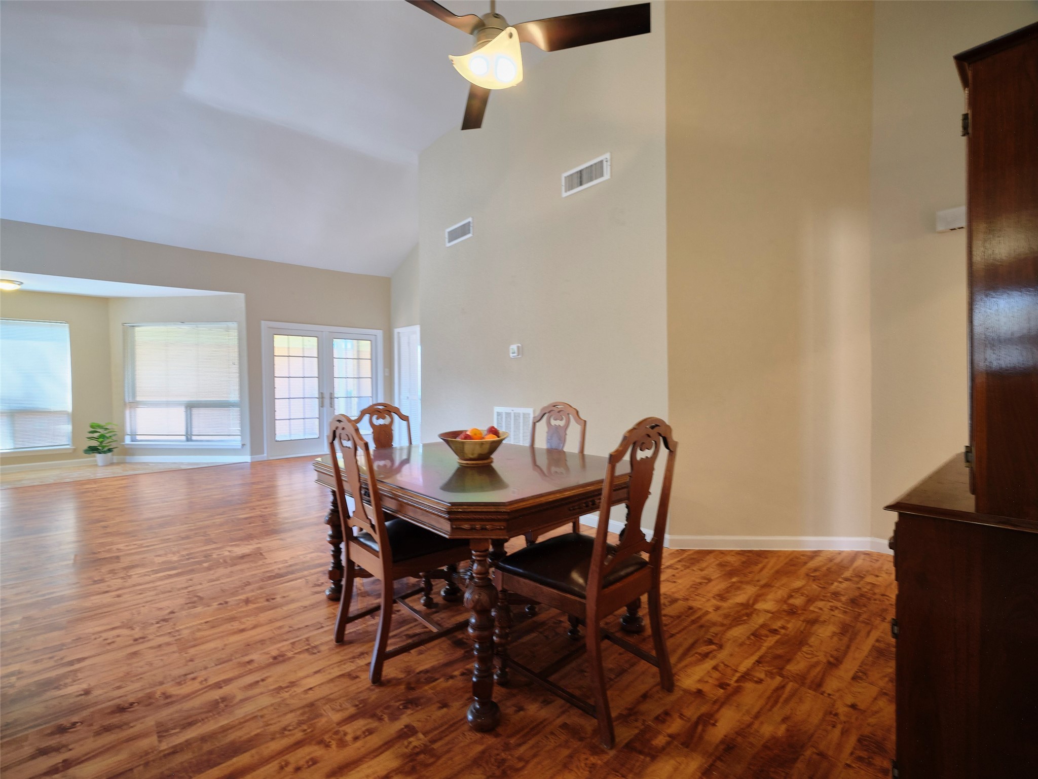 8315 Terrace Wind Lane Houston, TX 77040 - Photo 35 of 50 a dining room with furniture and wooden floor