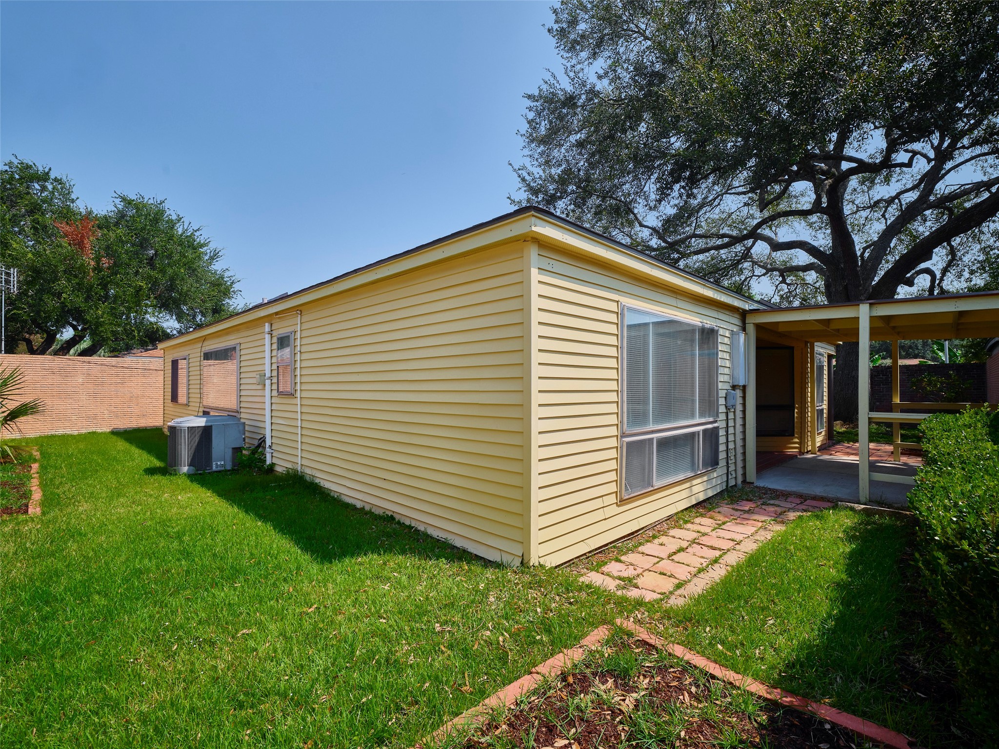 8315 Terrace Wind Lane Houston, TX 77040 - Photo 47 of 50 a view of a house with a backyard