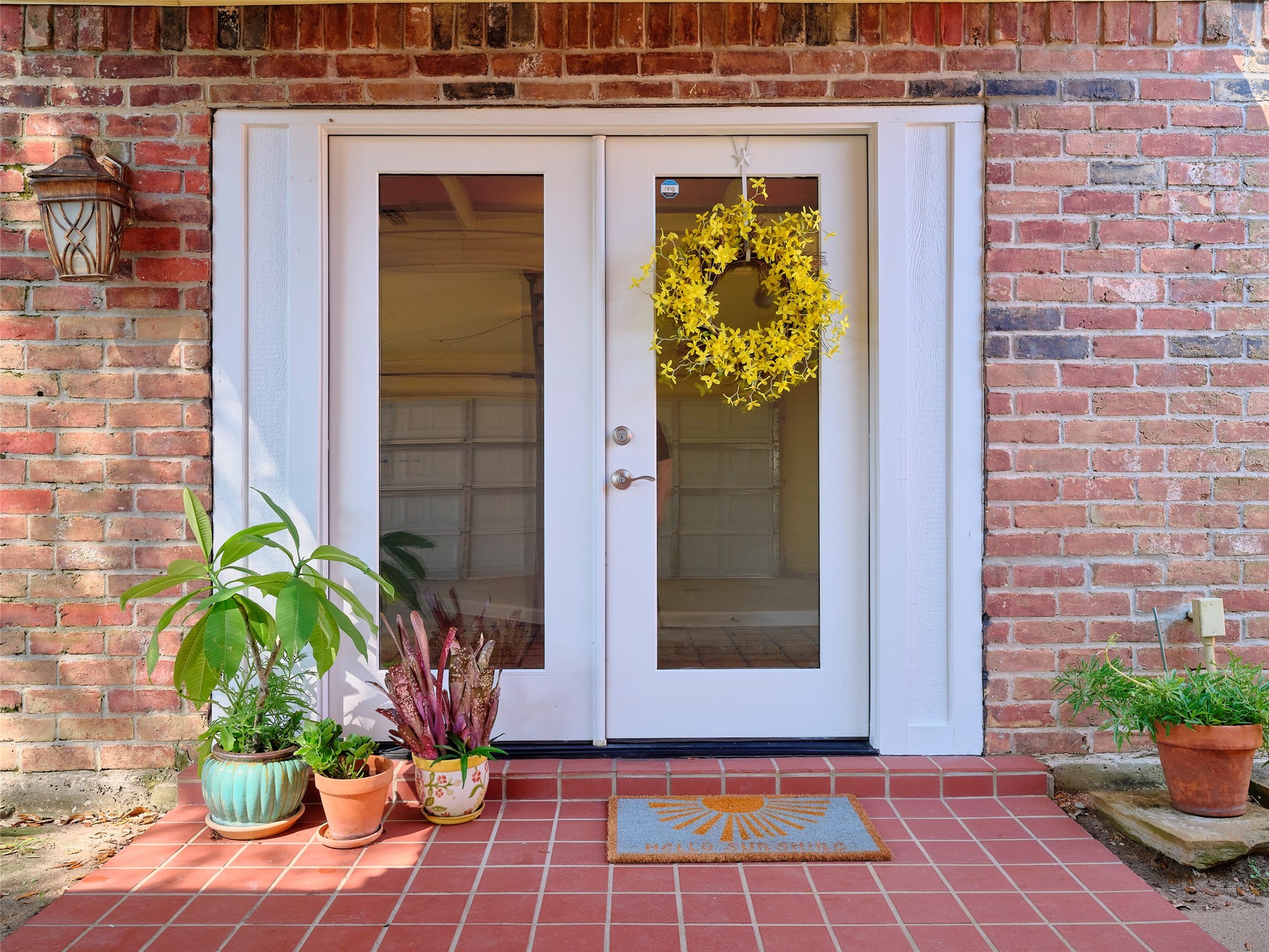 8315 Terrace Wind Lane Houston, TX 77040 - Photo 50 of 50 a view of a door with a potted plants