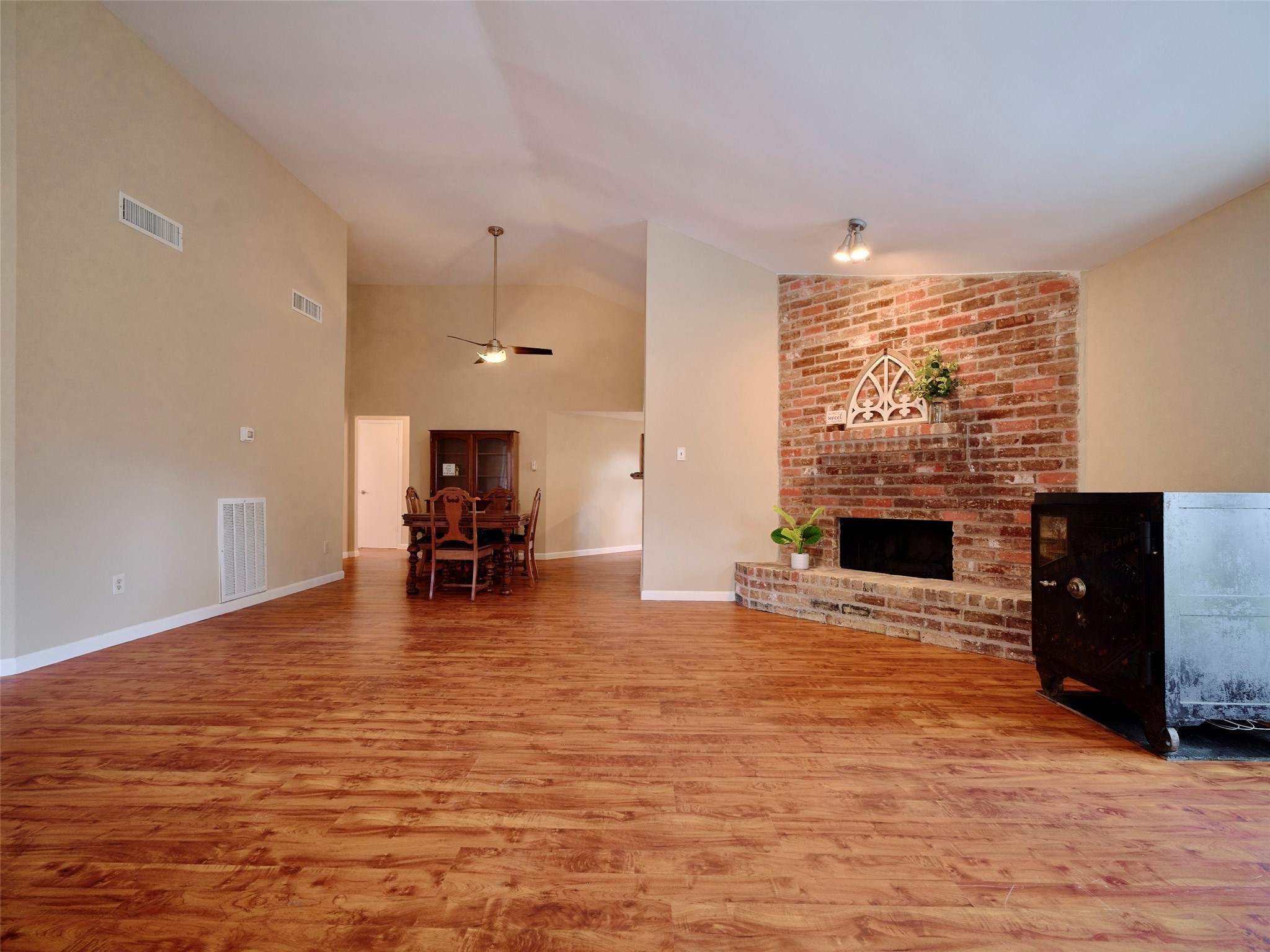 8315 Terrace Wind Lane Houston, TX 77040 - Photo 8 of 50 a living room with furniture and a fireplace