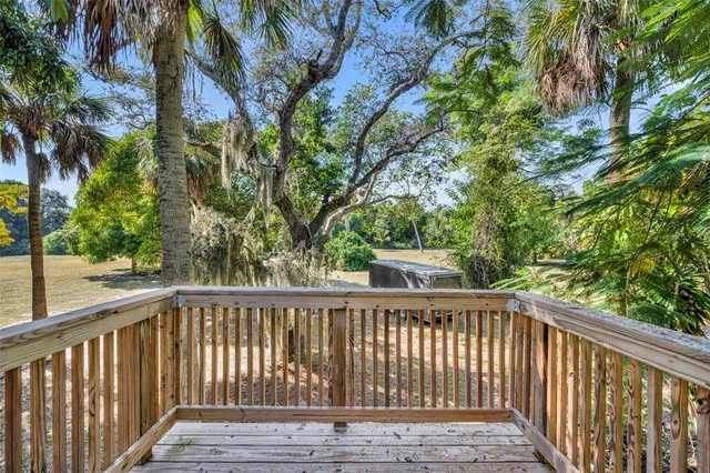 a view of house with backyard