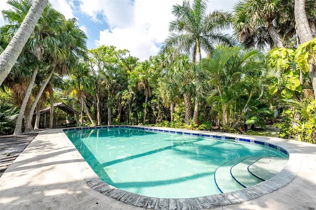 a house with trees in front of it