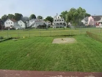 a view of roof deck with patio