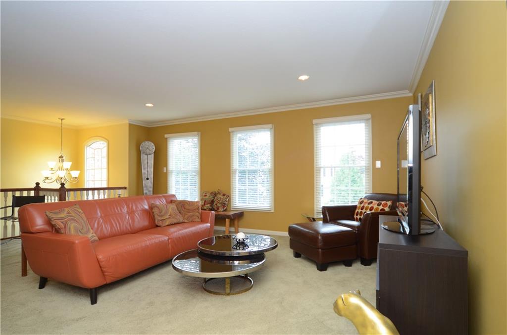941 Montclair Drive Coraopolis, PA 15108 - Photo 3 of 20 The spacious living room includes large windows and recessed lighting.