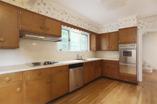 59 Garland Road Newton, MA 02459 - Photo 4 of 6 a kitchen with cabinets a sink and appliances