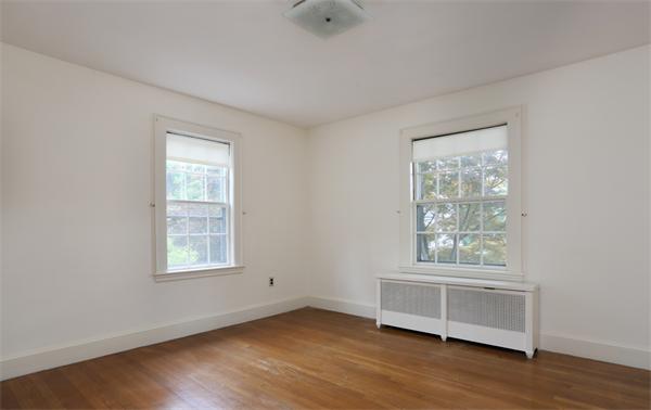 59 Garland Road Newton, MA 02459 - Photo 5 of 6 a view of room with hardwood floor and window
