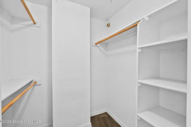 a view of bathroom with a tub shower and a sink