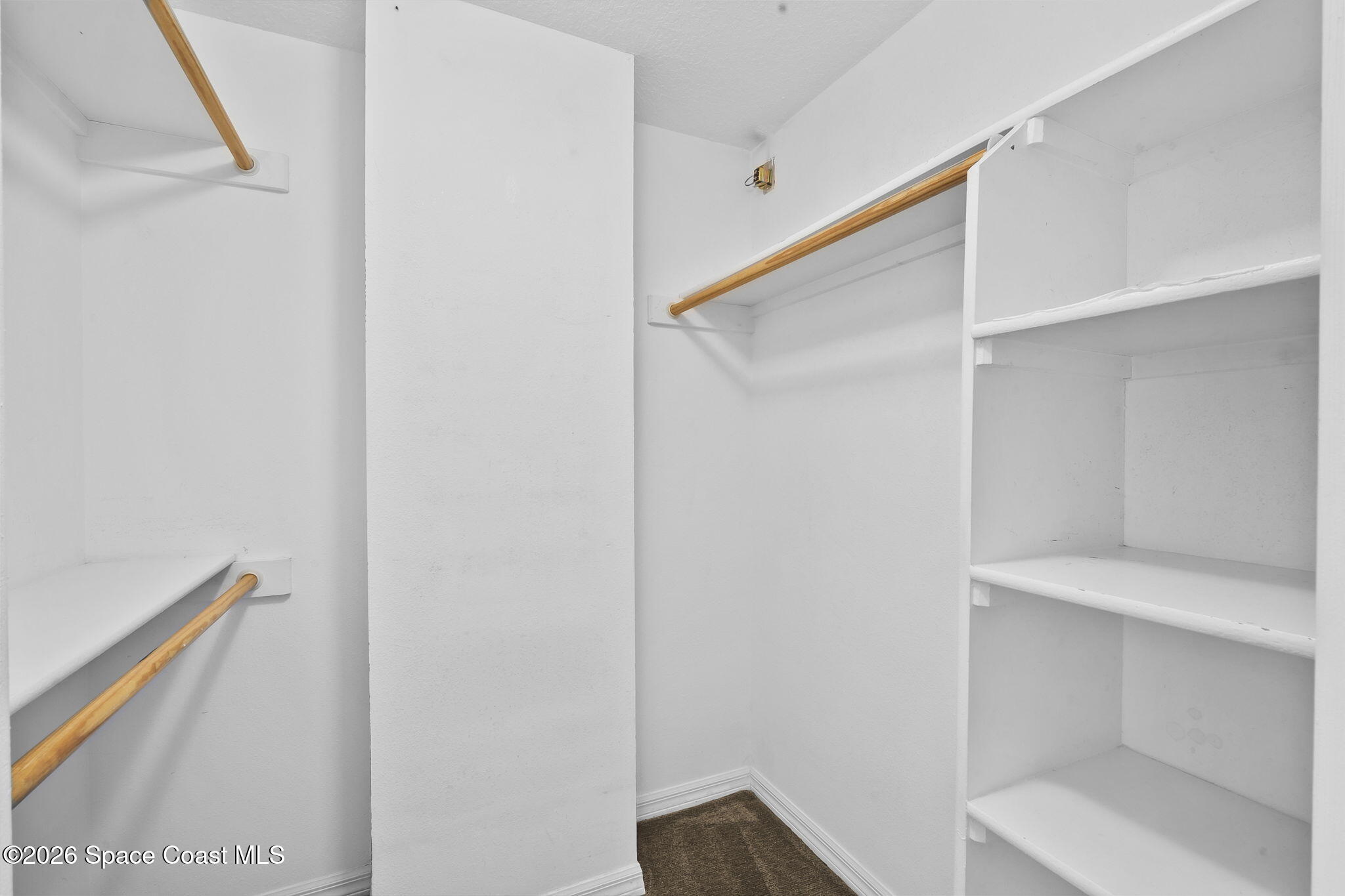 104 Riverside Drive, Unit 403 Cocoa, FL 32922 - Photo 13 of 61 Primary Closet