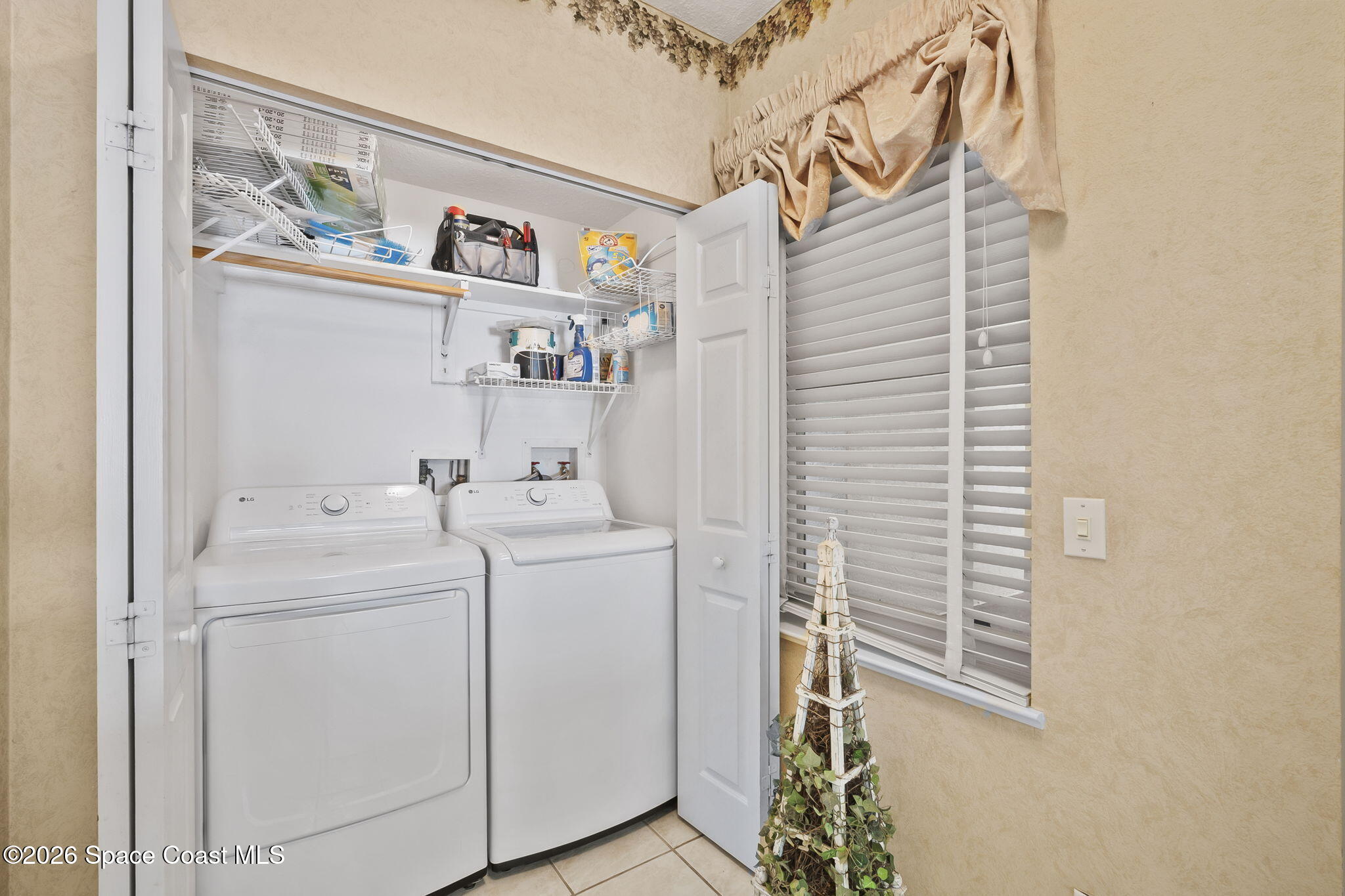 104 Riverside Drive, Unit 403 Cocoa, FL 32922 - Photo 7 of 61 Laundry