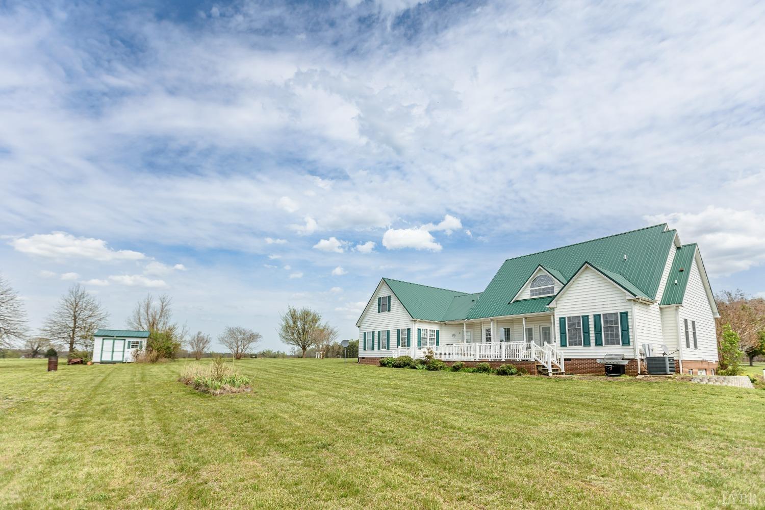 1692 West Courthouse Road Crewe, VA 23930 - Photo 51 of 67 a front view of house with yard and island in the background