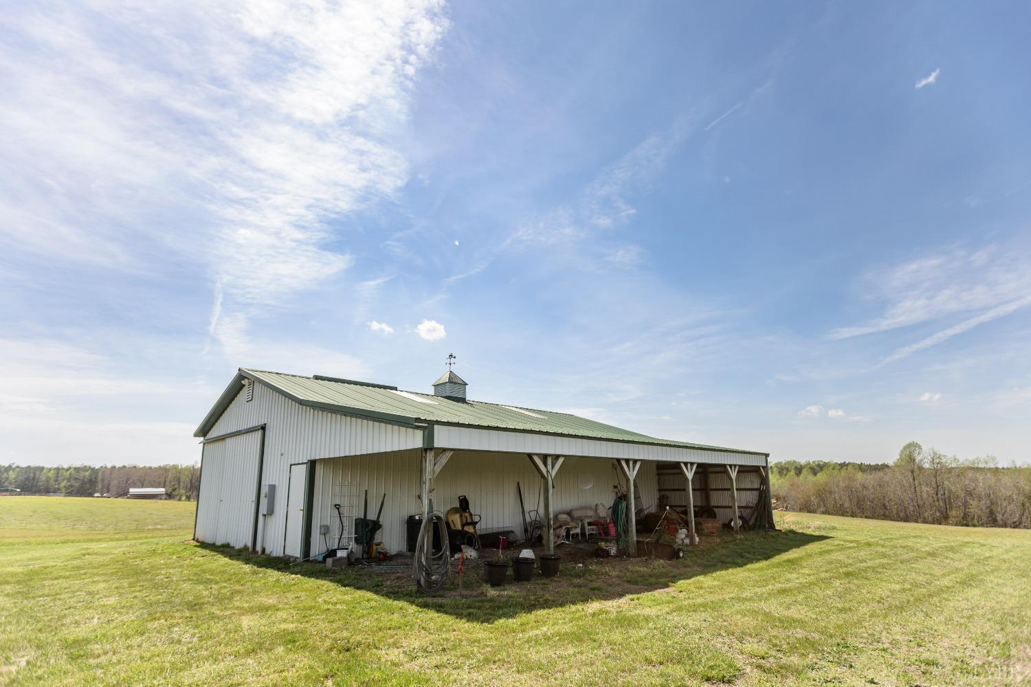 1692 West Courthouse Road Crewe, VA 23930 - Photo 55 of 67 a view of a house with swimming pool and a yard