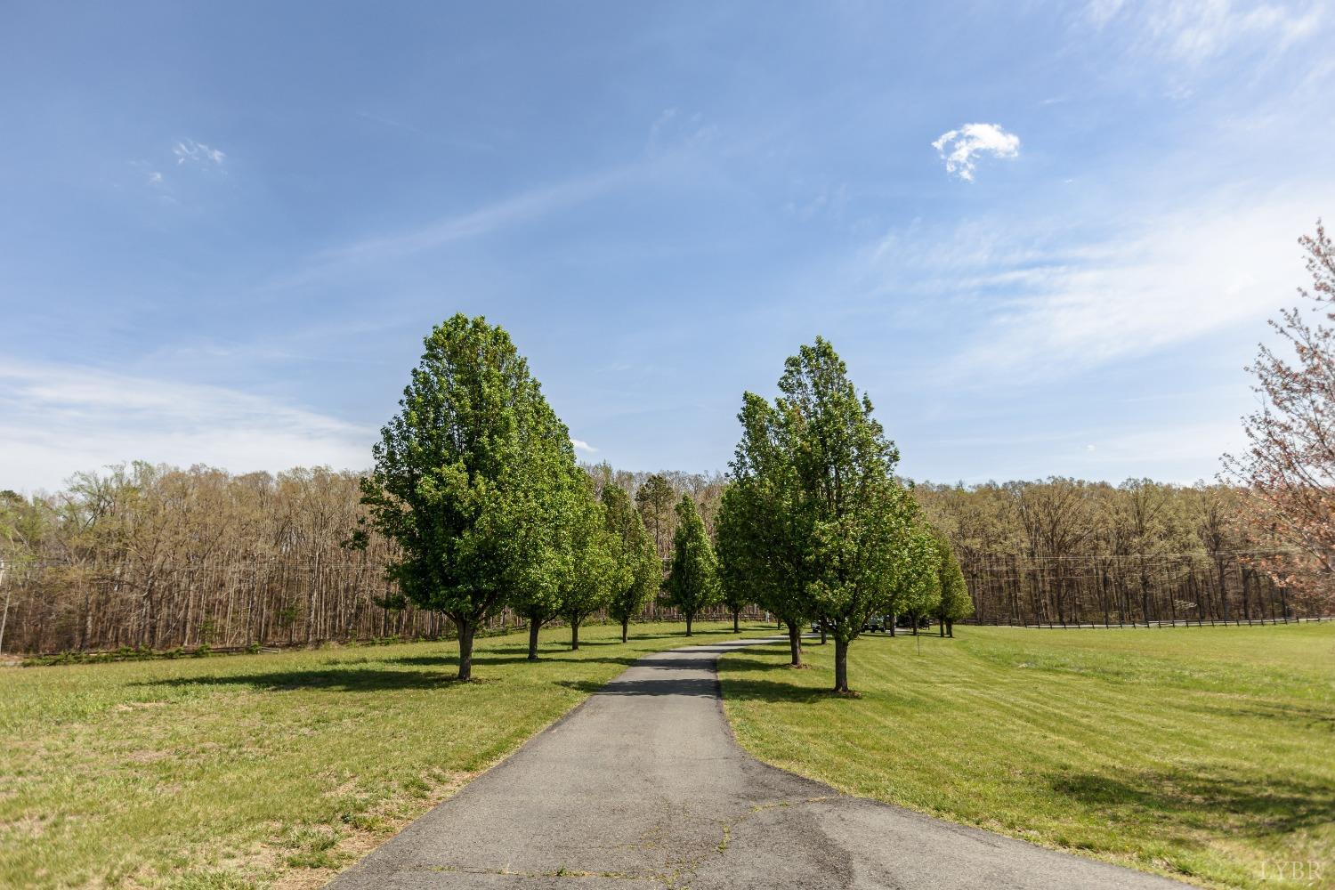 1692 West Courthouse Road Crewe, VA 23930 - Photo 63 of 67 a view of a golf course with a lake