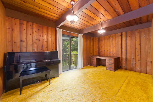 a bedroom with a bed and furniture