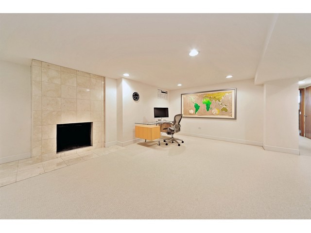 2921 Sheridan Road Evanston, IL 60201 - Photo 17 of 25 a view of a livingroom with furniture and a fireplace