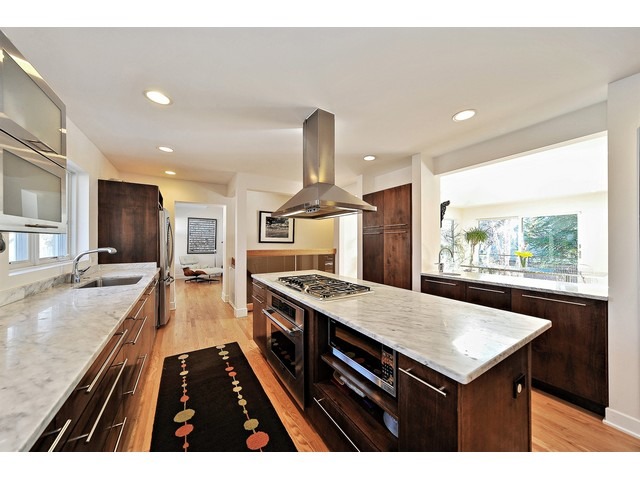 2921 Sheridan Road Evanston, IL 60201 - Photo 7 of 25 a dining hall with stainless steel appliances granite countertop a stove and a sink
