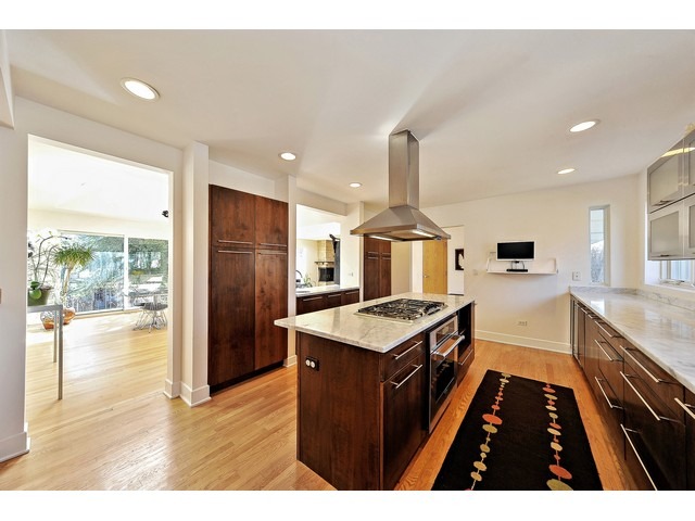 2921 Sheridan Road Evanston, IL 60201 - Photo 8 of 25 a kitchen with stainless steel appliances a stove a refrigerator and a refrigerator